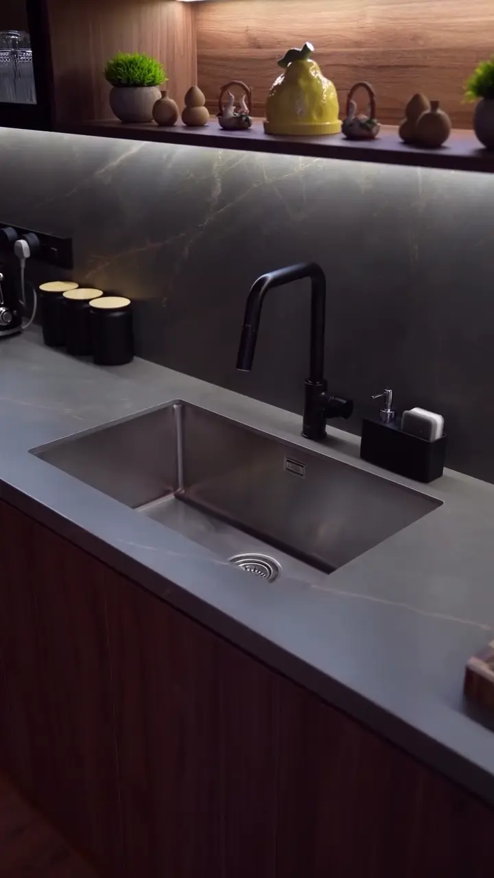 Dark worktop and sink detail